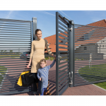 Woman and Child Exiting Gate with Locinox Samson 2 Hydraulic Gate Closer Installed