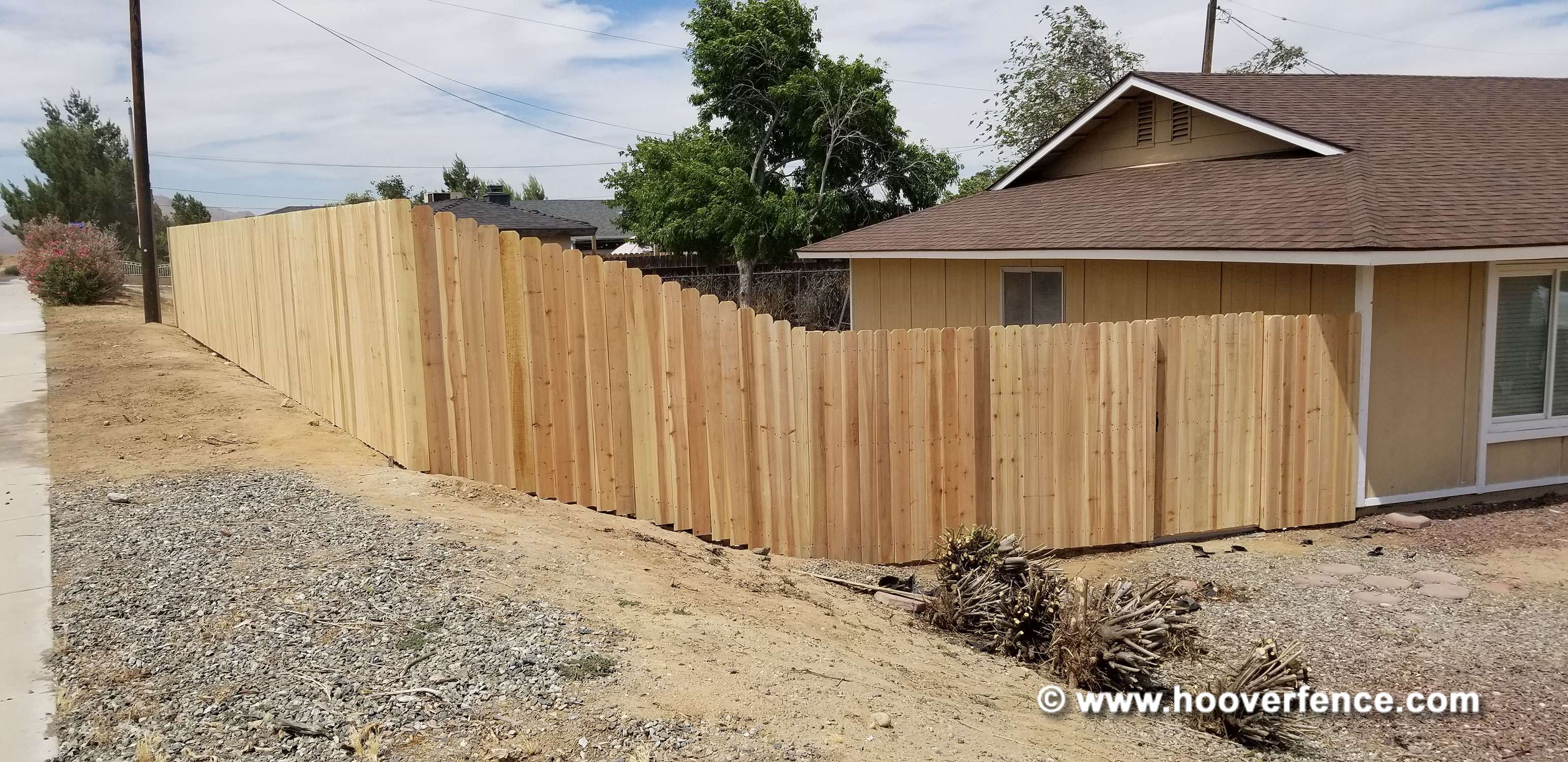 Customer Photo - 6'H Dog Ear Wood Fence Installed with Chain Link Fence Posts and IS-FBL-L Fence Brackets