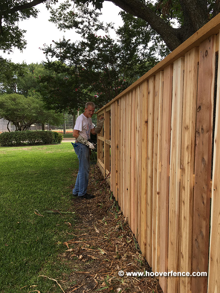 Customer Photo - Cedar Shadowbox Wood Fence Build with Chain Link Fence Posts and IS-FBL-L Brackets - Richardson, TX
