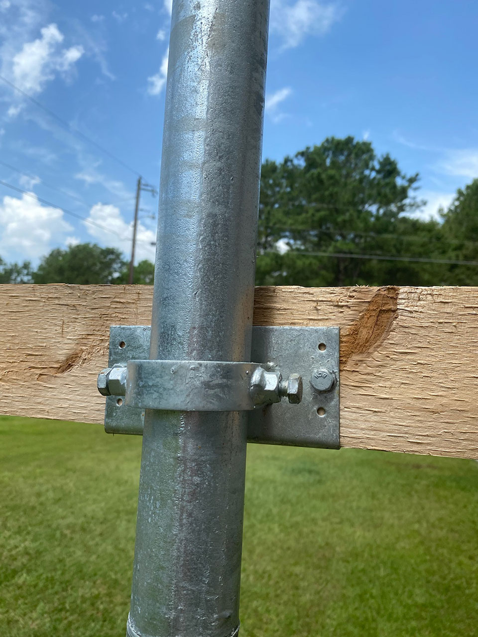 Customer Photo - Cedar Board and Batten Privacy Fence Built With Chain Link Fence Posts and Wood to Steel Fence Brackets - Abita Springs, LA