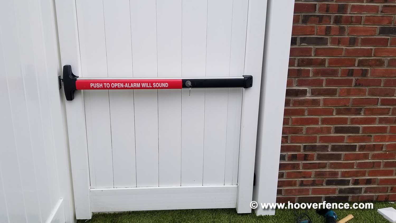 Customer Photos - D-6008 Surface Mount Exit Bar with Alarm Installed on Vinyl Fence Gate - Glenside, PA